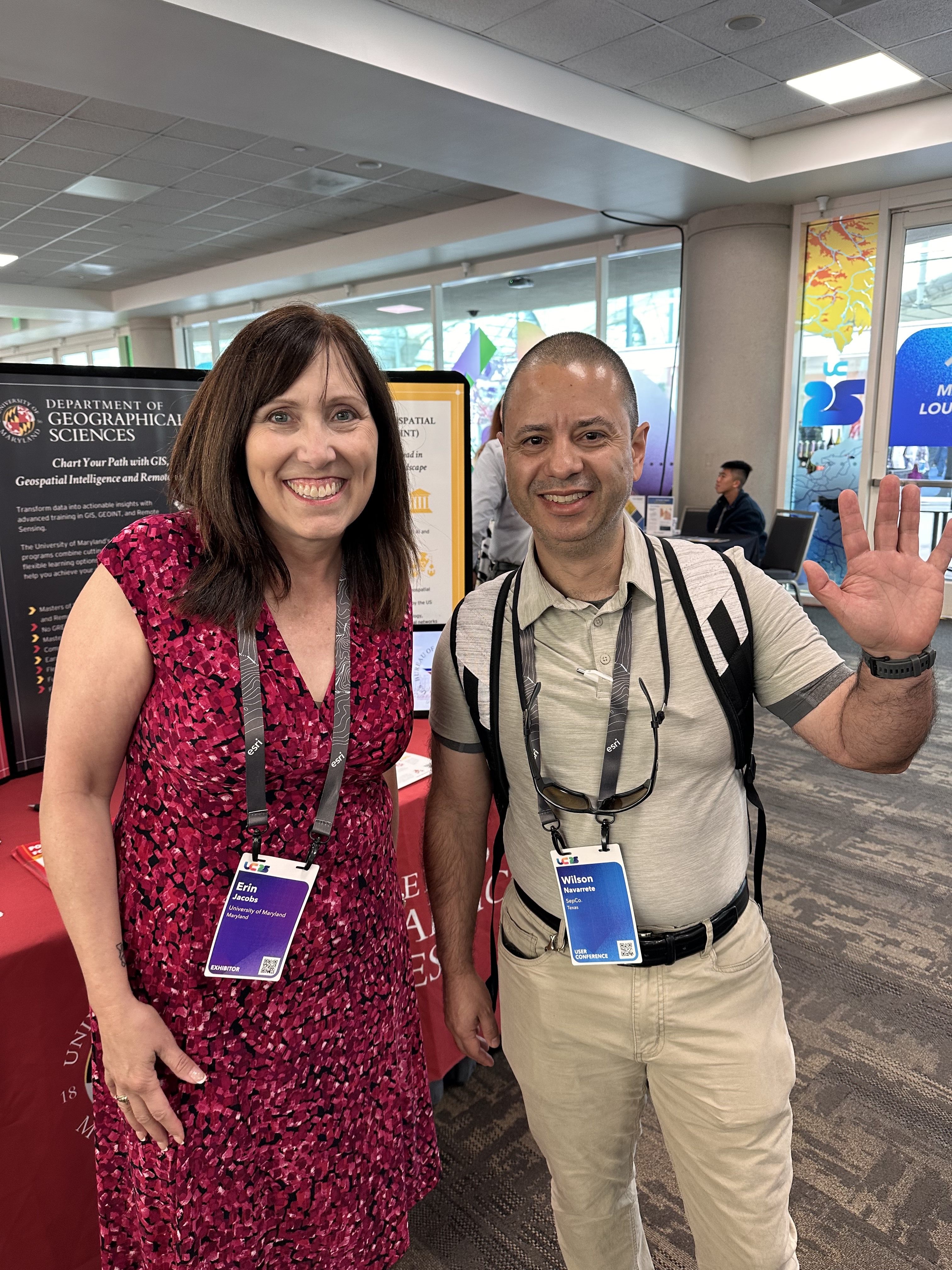 Image 5: Wilson Naverrette (Right) and program coordinator Erin Jacobs (Left) at the MS GIS and GEOINT table during the Academic Fair at the Esri User Conference.