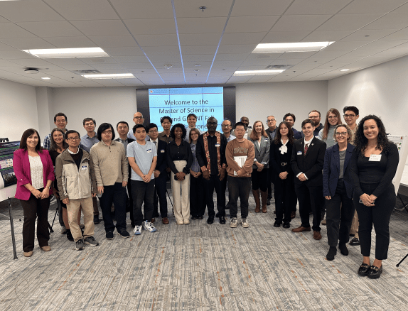 Group photo featuring MS students, faculty and staff