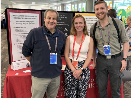 Demian Rybock (Left), Lain Graham (Center), and Alexander Perigon (Right) at the MS GIS and GEOINT table during the Academic Fair at the Esri User Conference