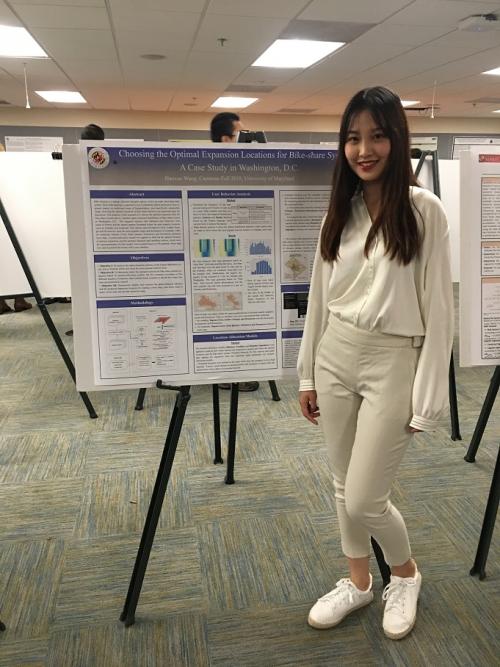 Haoxue Wang, one of our NNU students, poses with her project