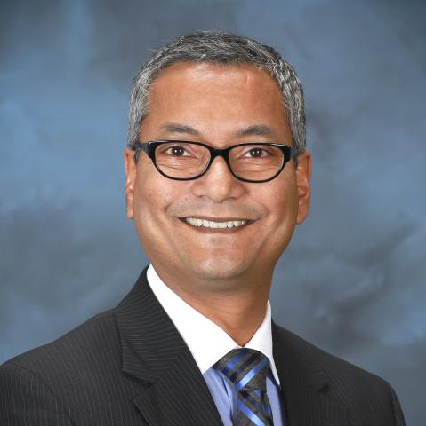 Dr. Budhu